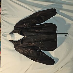 Winlit genuine leather and suede jacket.